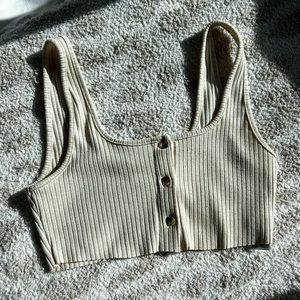 Topshop micro mini top. Cute paired with jeans or trousers. Neutral color